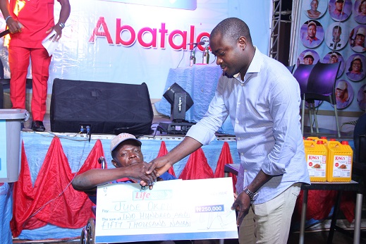 (L-R) Jude Okeh, a handicapped entrepreneur from Life Continental Beer's Progess Booster Show with the Senior Brand Manager, Regional Mainstream NB Plc,   Mr. Funso Ayeni in Owerri