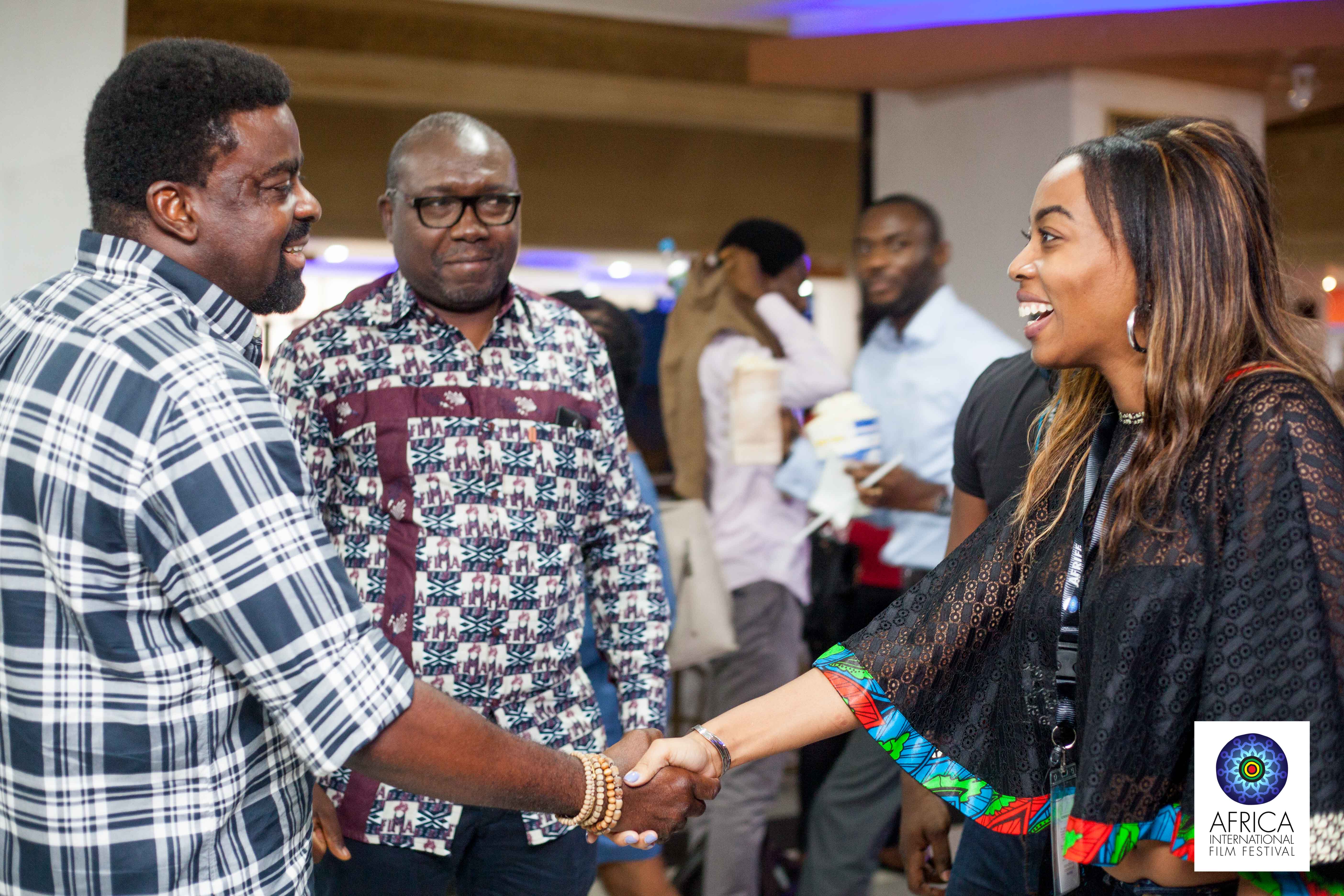 filmmaker-kunle-afolayan-welcoming-some-foregn-guests-at-the-ongoing-afriff-1