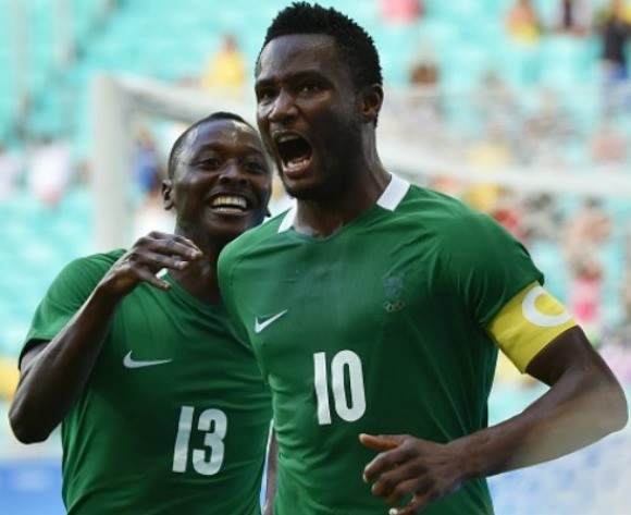 Eagles captain, John Mikel Obi (right) celebrates with Ahmed Musa.